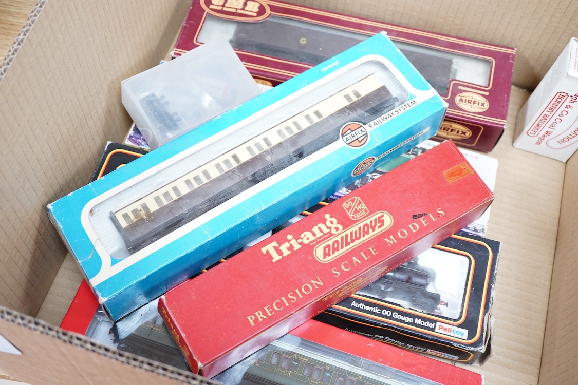 A quantity of 00 gauge railway by various makes, comprising; nine locomotives by Tri-ang, Hornby Dublo, etc. (one missing tender), sixteen maroon bogie coaches and eighteen freight wagons